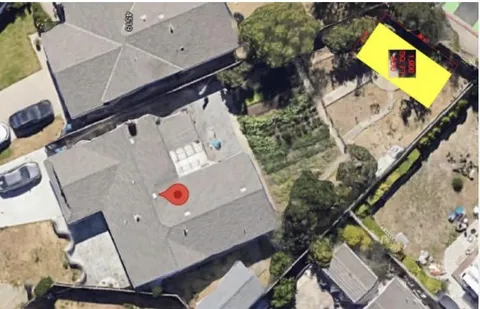 a view of a golf course with a lake view