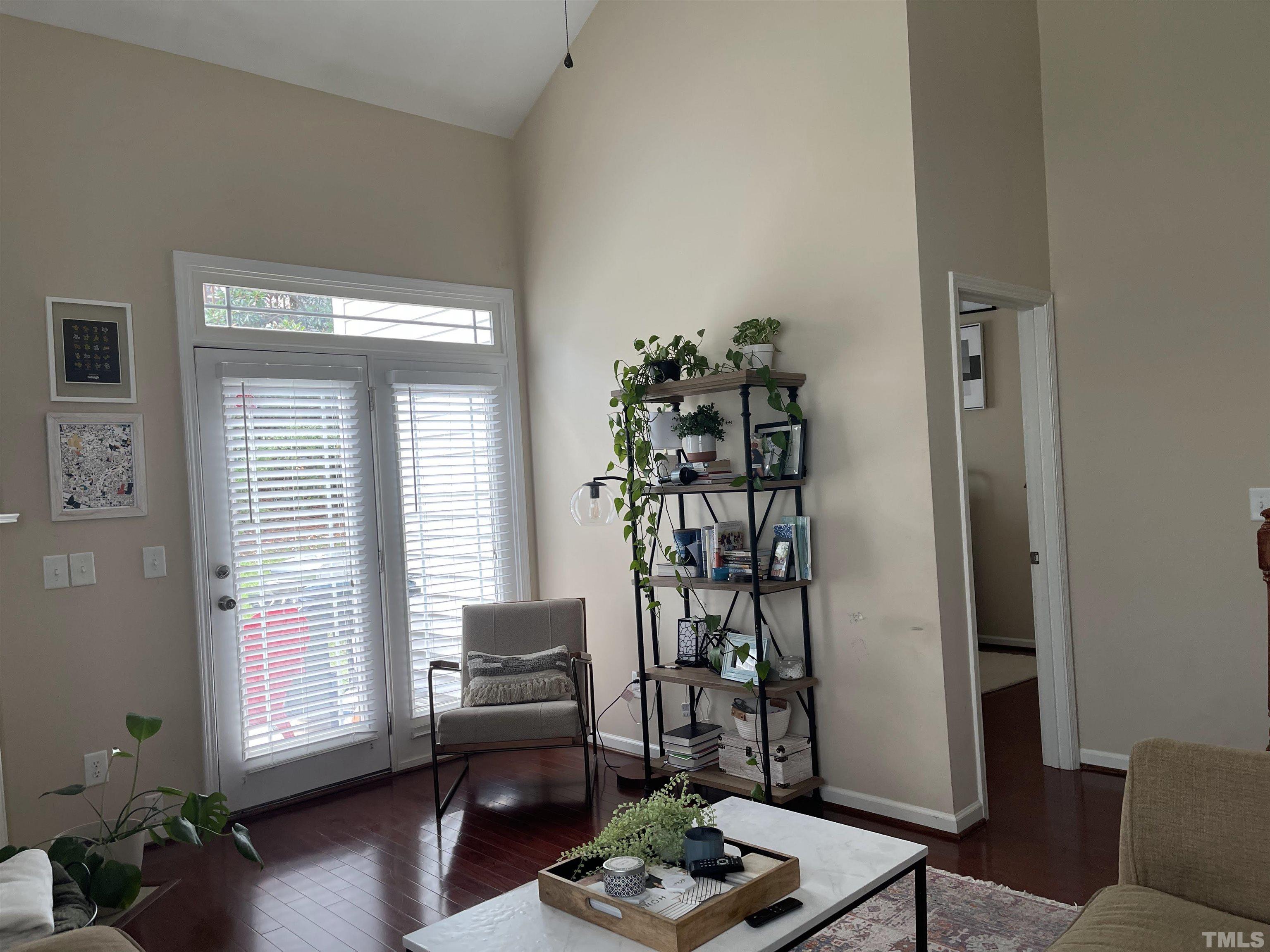 4711 Altha Street Raleigh, NC 27606 - Photo 12 of 25 a living room with furniture and a window