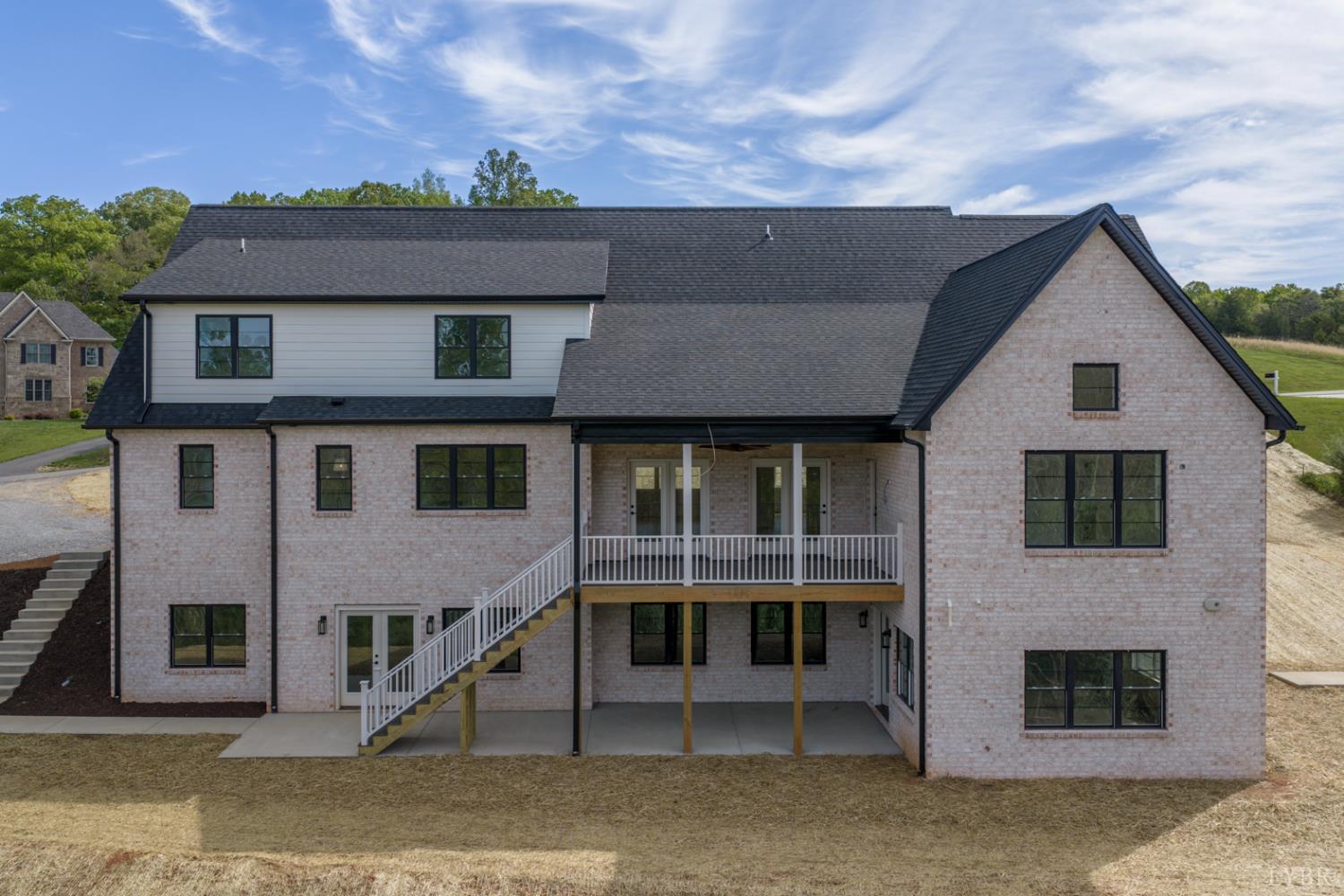 1488 Deer Hollow Road Forest, VA 24551 - Photo 2 of 68 a front view of a house with a garage