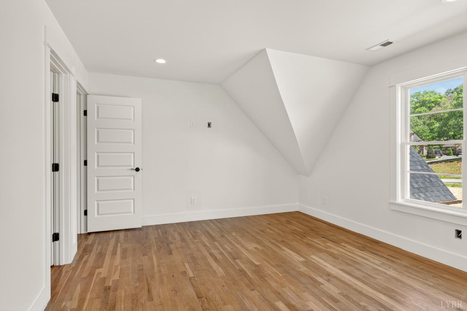 1488 Deer Hollow Road Forest, VA 24551 - Photo 52 of 68 wooden floor in an empty room with a window