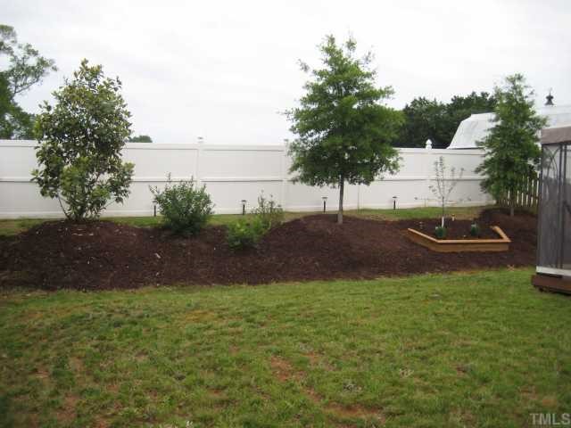 148 Solheim Lane Raleigh, NC 27603 - Photo 11 of 12 a view of a backyard