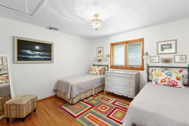 a bedroom with a bed and furniture