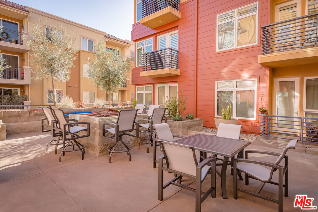 4050 Glencoe Avenue, Unit 405 Marina del Rey, CA 90292 - Photo 39 of 42 a view of a dining room with furniture and a window