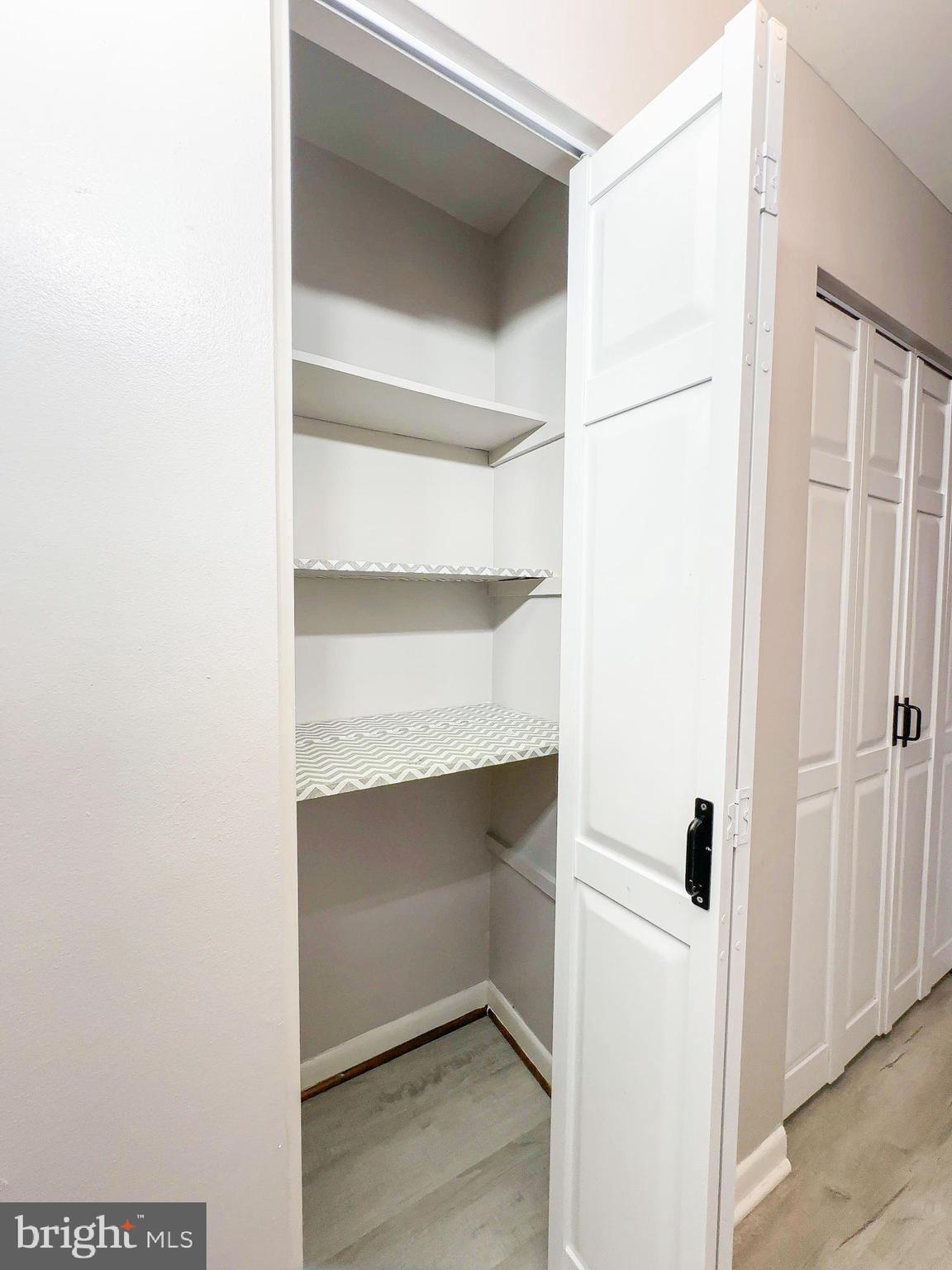 614 Sligo Avenue, Unit 405 Silver Spring, MD 20910 - Photo 13 of 31 a view of an empty walk in closet