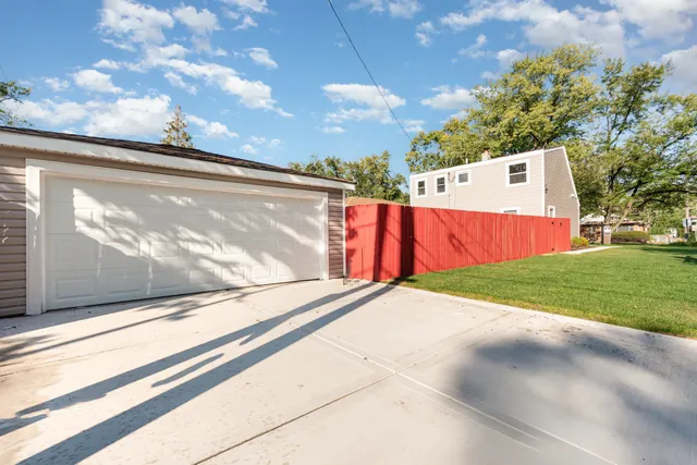 a view of backyard with outdoor space