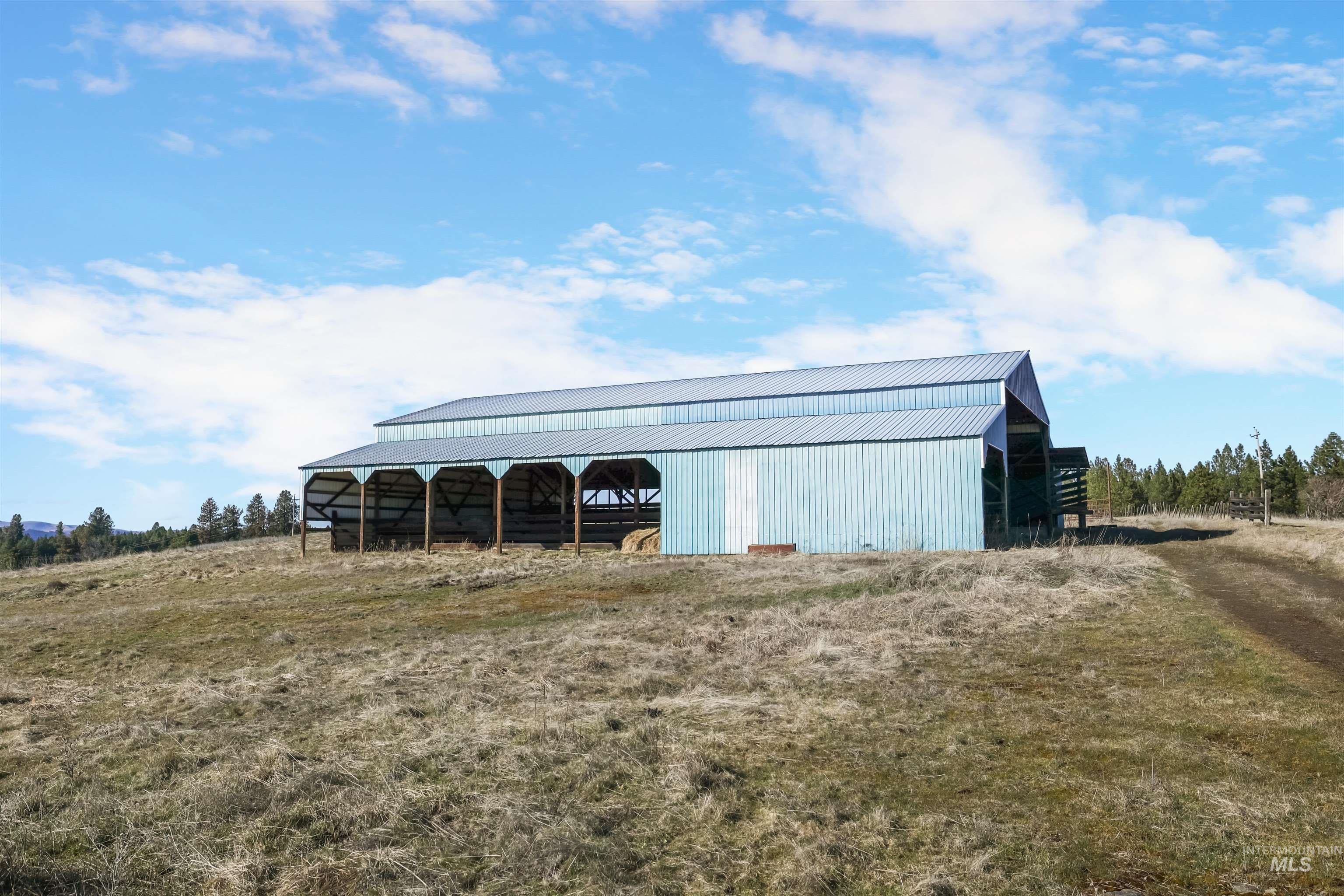 216 Ulmer Road Kooskia, ID 83539 - Photo 39 of 47 View of pole building featuring a view of rural / pastoral area