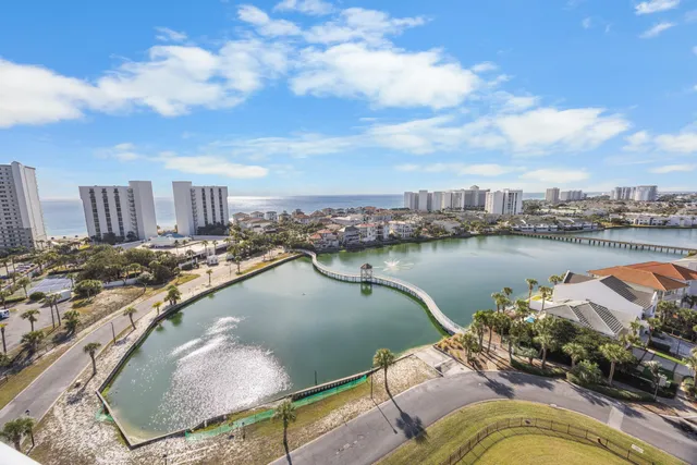 a view of a lake with a city