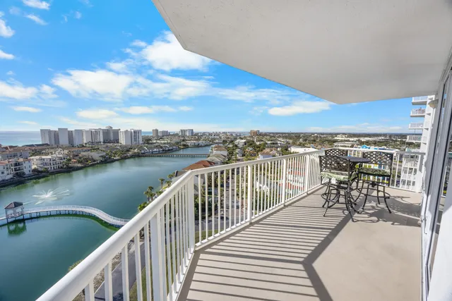a view of a balcony with city view