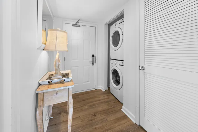 a view of a storage and utility room with washer and dryer