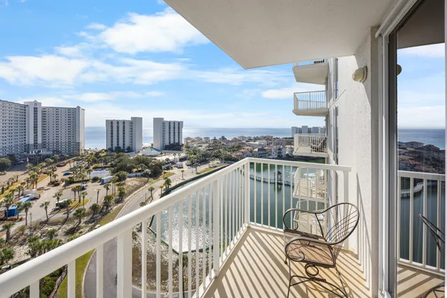 a view of balcony with furniture