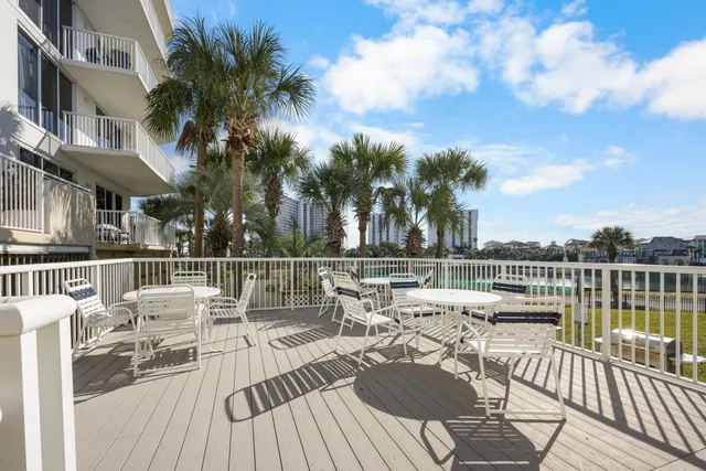 a view of a lake with furniture