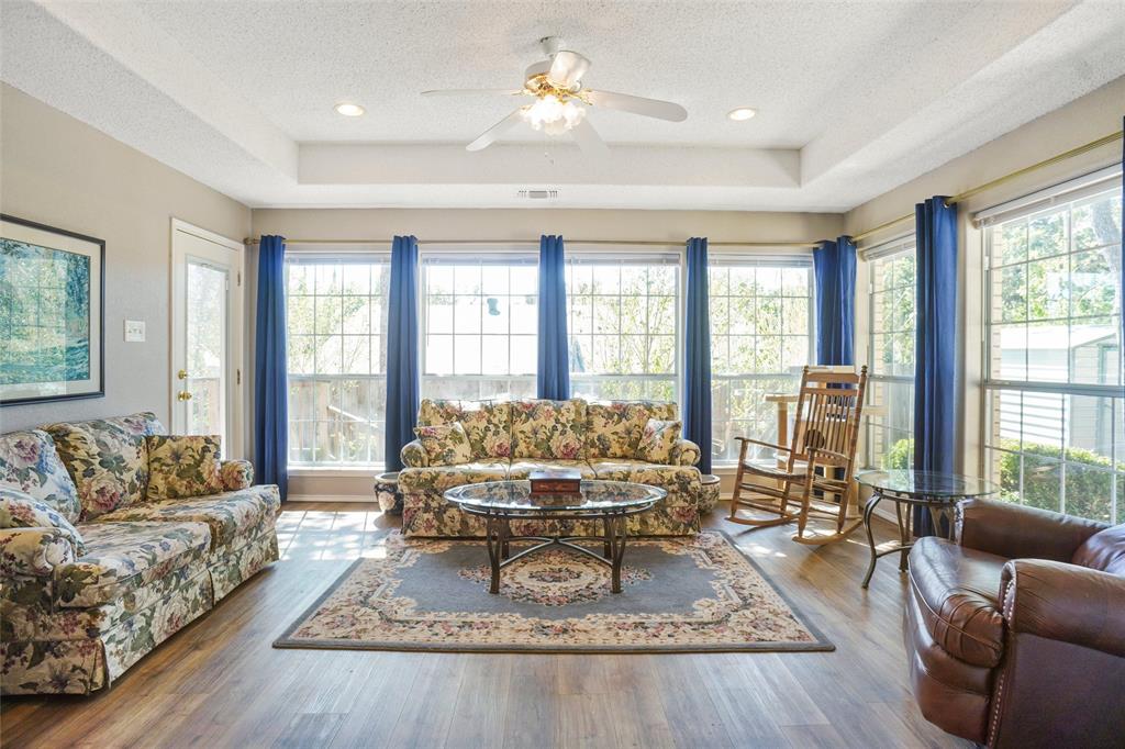 1116 Shadow Ridge Drive Azle, TX 76020 - Photo 11 of 27 a living room with furniture and a large window