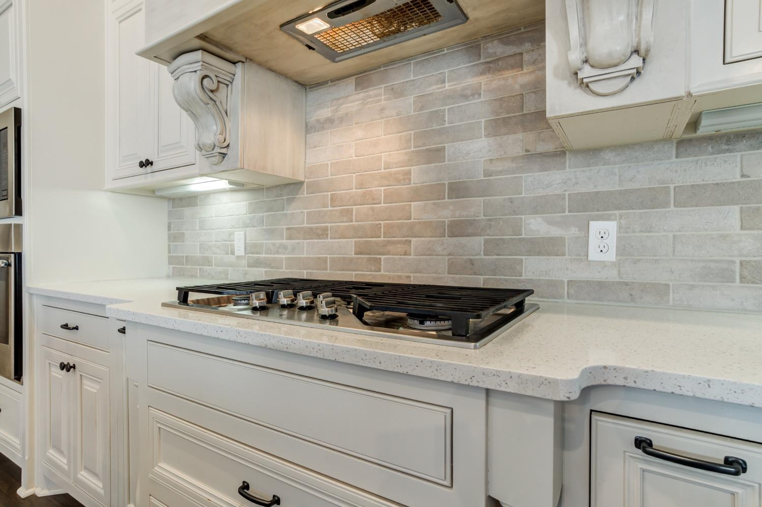 402 Topeka Avenue Lubbock, TX 79416 - Photo 14 of 41 a white stove top oven sitting inside of a kitchen