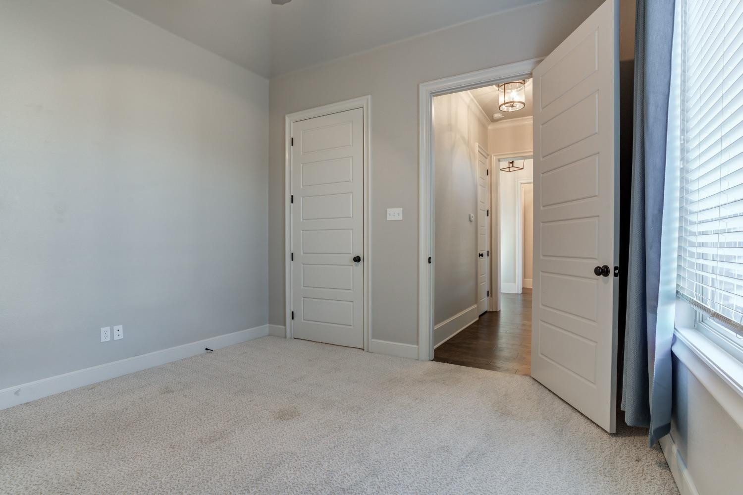 402 Topeka Avenue Lubbock, TX 79416 - Photo 27 of 41 an empty room with closet area