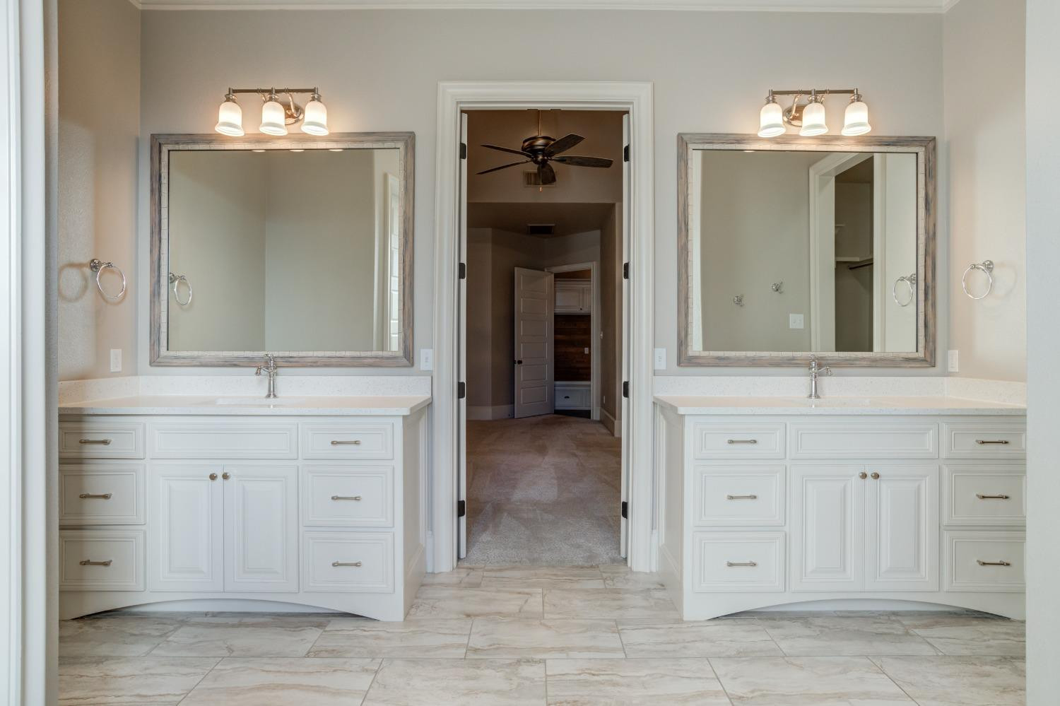 402 Topeka Avenue Lubbock, TX 79416 - Photo 34 of 41 a bathroom with a sink vanity and mirror