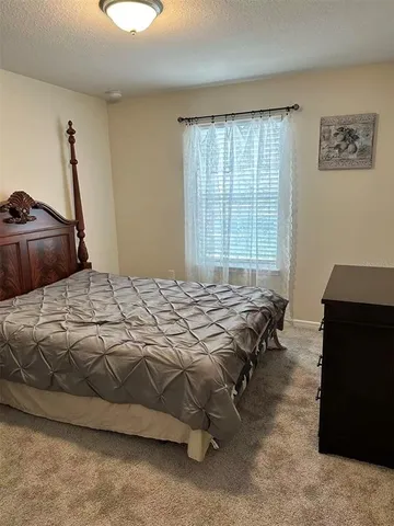 a bathroom with a double vanity sink a and a mirror
