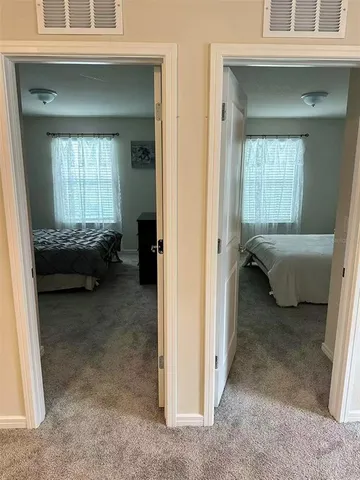 a bedroom with a bed and closet