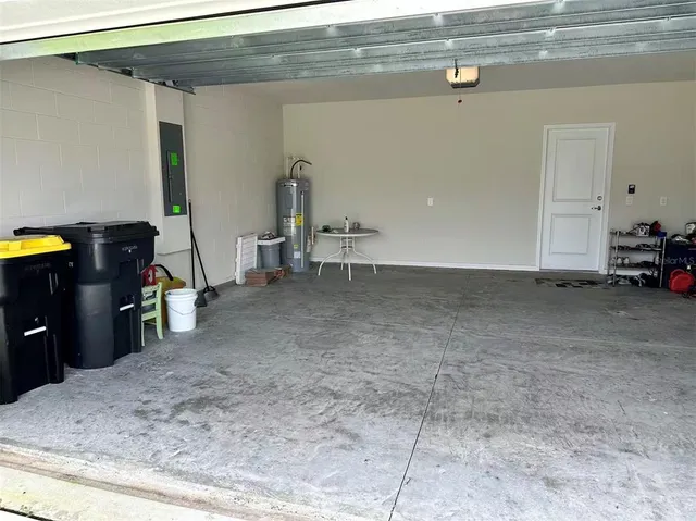 a view of a patio with swimming pool table and chairs