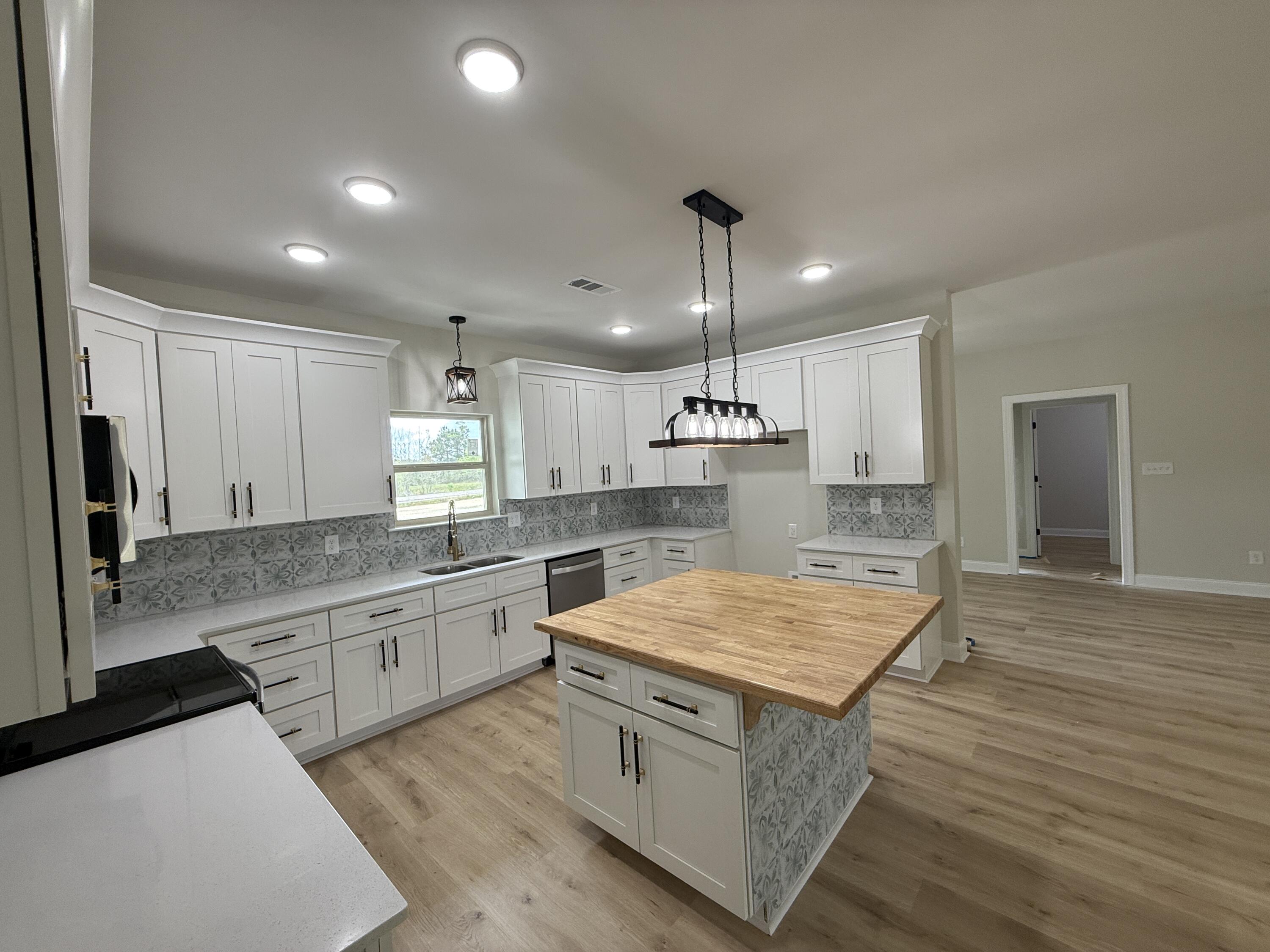 1041 Fairway Ridge Drive Wrens, GA 30833 - Photo 5 of 10 Kitchen With BRIGHT LIGHTS & lots of cabinets
