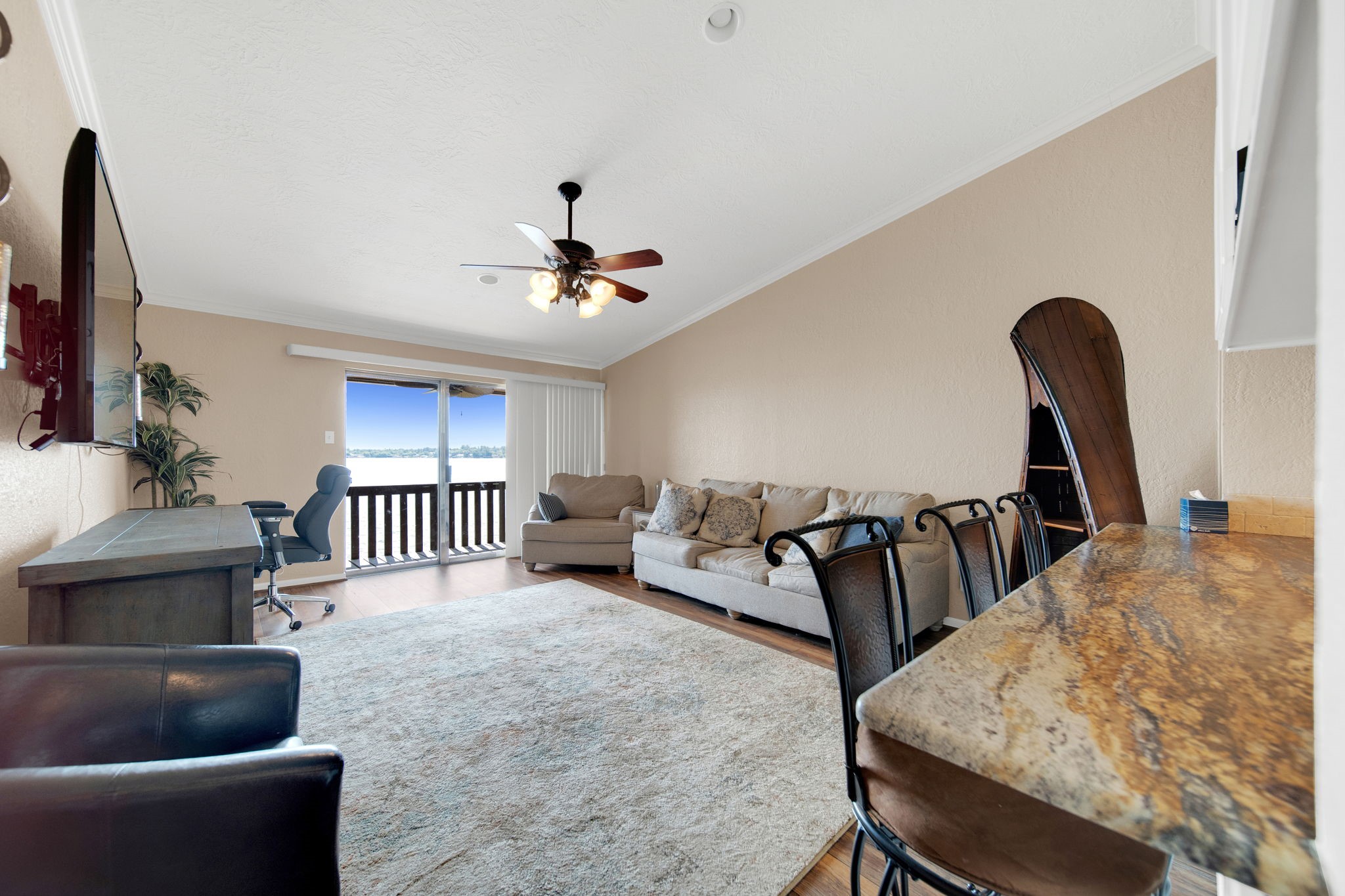 801 River Road, Unit E 116 Montgomery, TX 77356 - Photo 5 of 14 Kitchen opens up to the iving room with fantastic views of the lake.