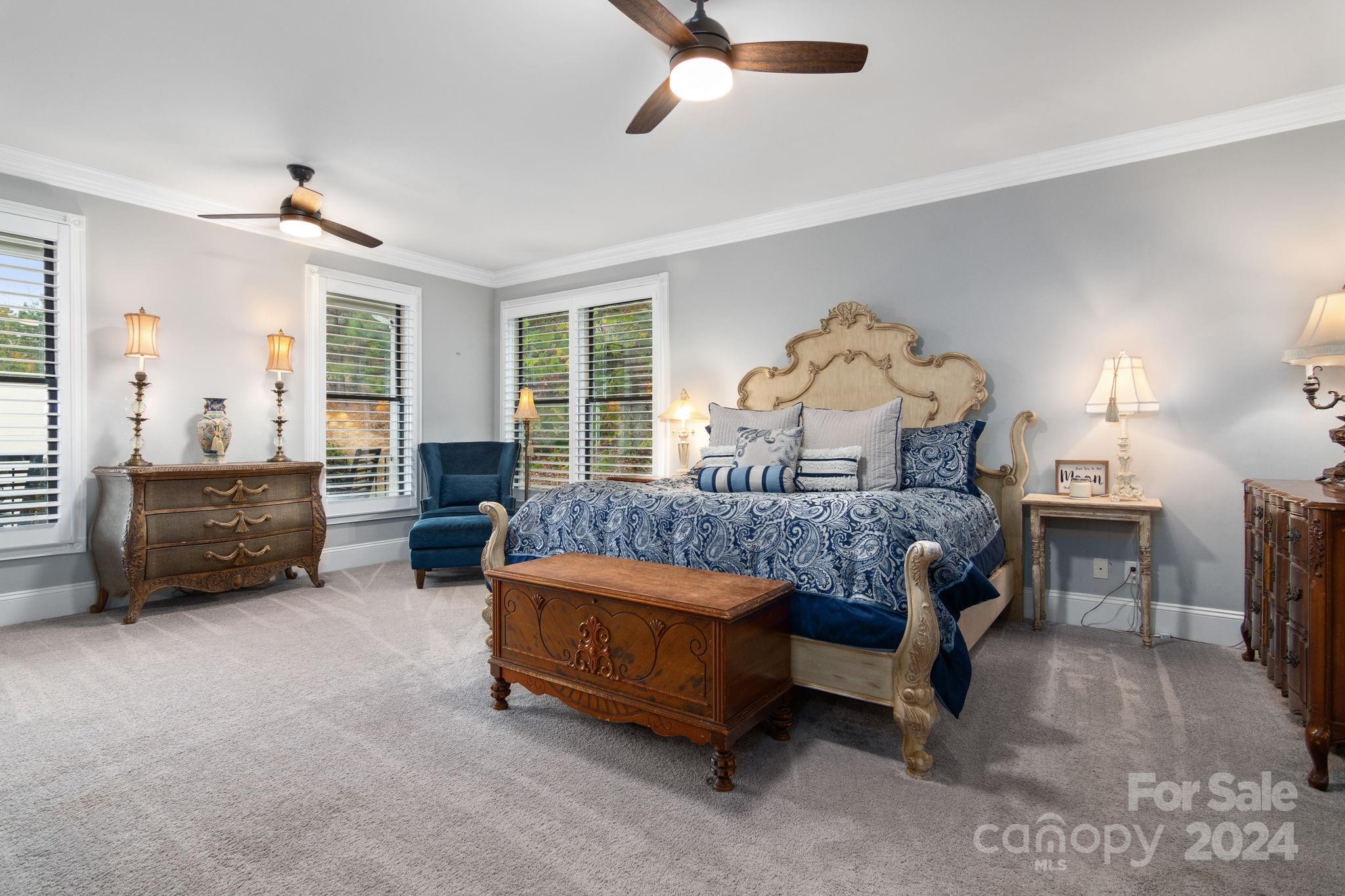 2049 Rocky Stream Road York, SC 29745 - Photo 13 of 47 a bedroom with a bed couch and a large window