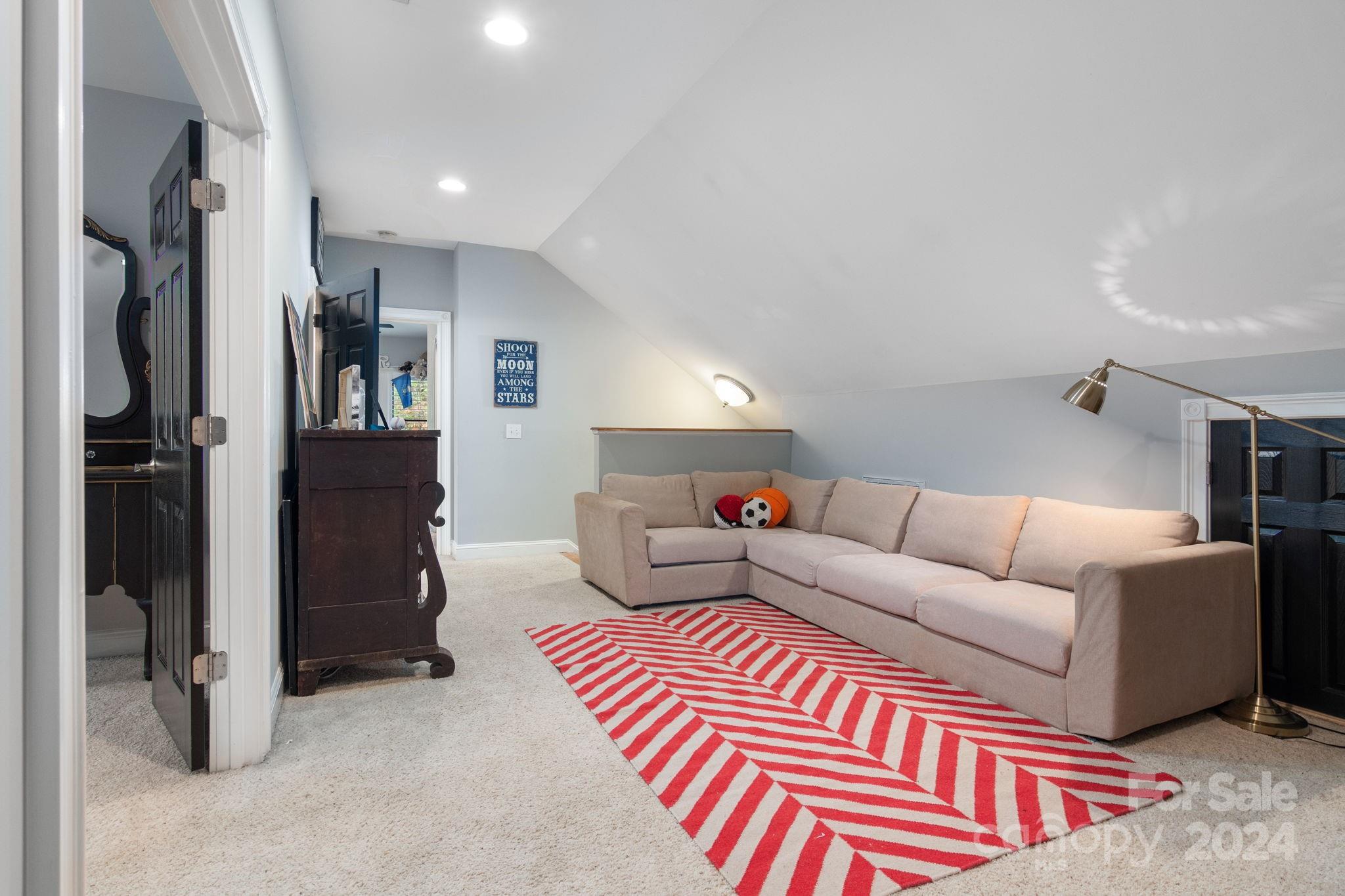 2049 Rocky Stream Road York, SC 29745 - Photo 17 of 47 a living room with furniture and a walk in closet
