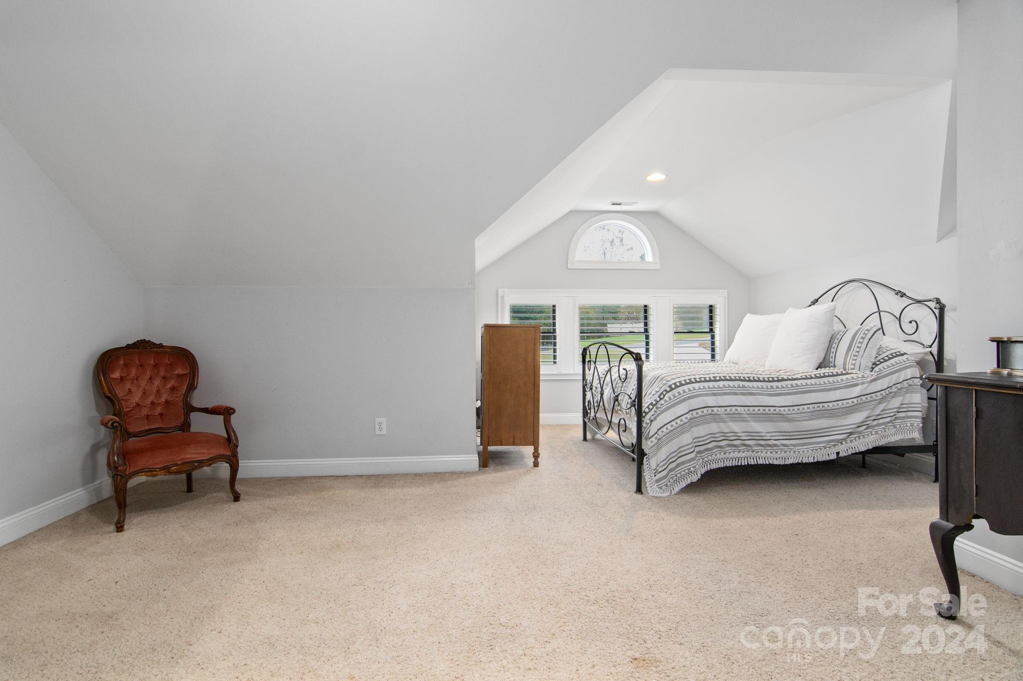 2049 Rocky Stream Road York, SC 29745 - Photo 20 of 47 a bedroom with a bed chair and piano