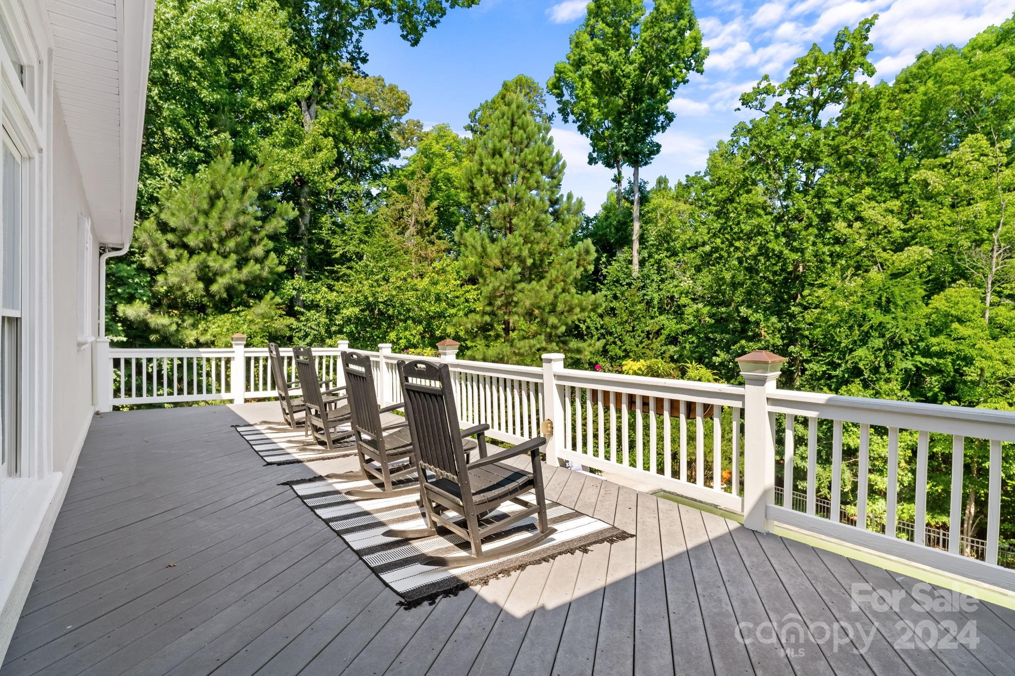2049 Rocky Stream Road York, SC 29745 - Photo 30 of 47 a view of a deck with wooden floor and fence