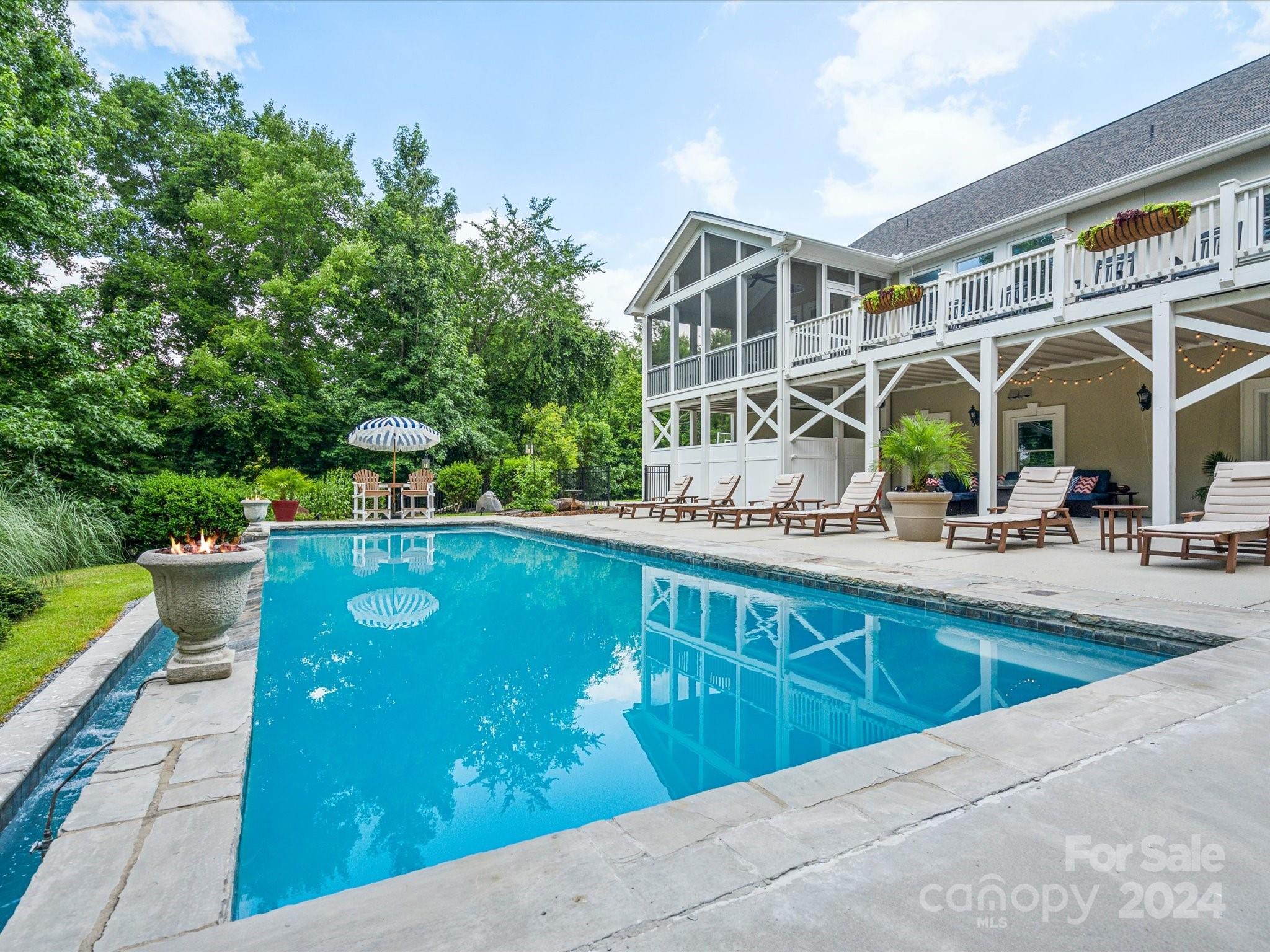 2049 Rocky Stream Road York, SC 29745 - Photo 32 of 47 a view of swimming pool with outdoor seating and yard