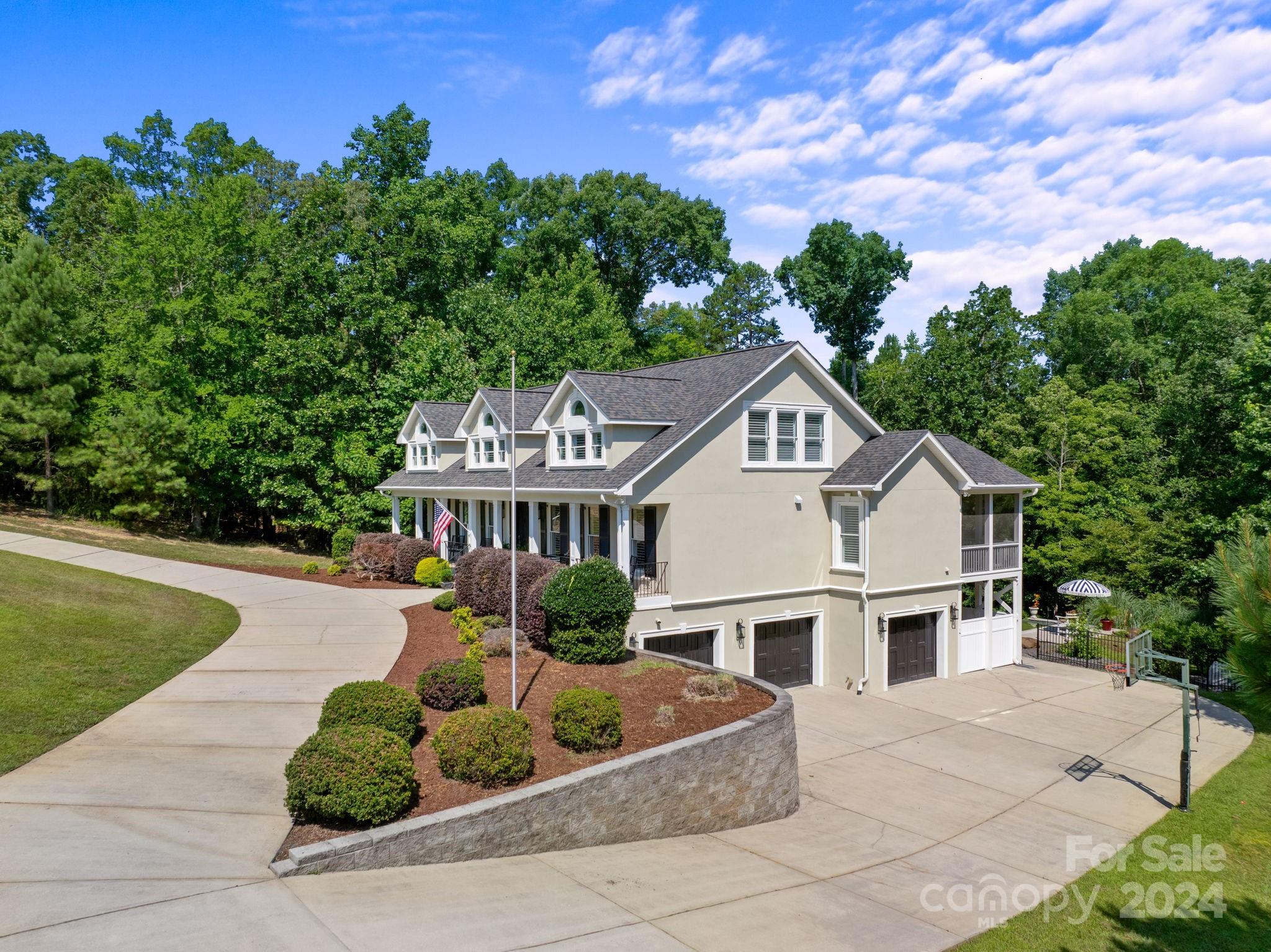 2049 Rocky Stream Road York, SC 29745 - Photo 40 of 47 a house with a garden in the background