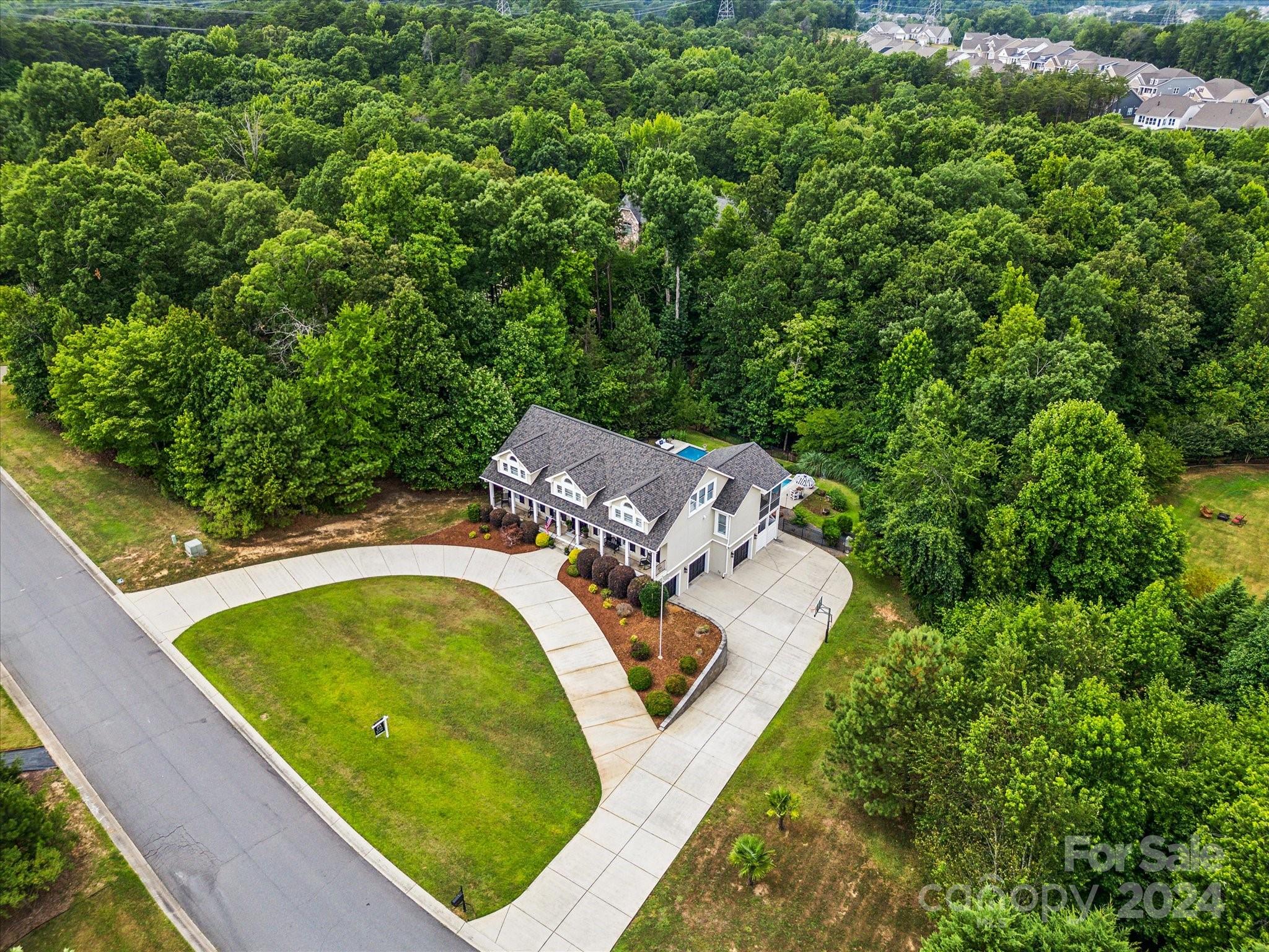 2049 Rocky Stream Road York, SC 29745 - Photo 42 of 47 an aerial view of a house with swimming pool patio and outdoor seating