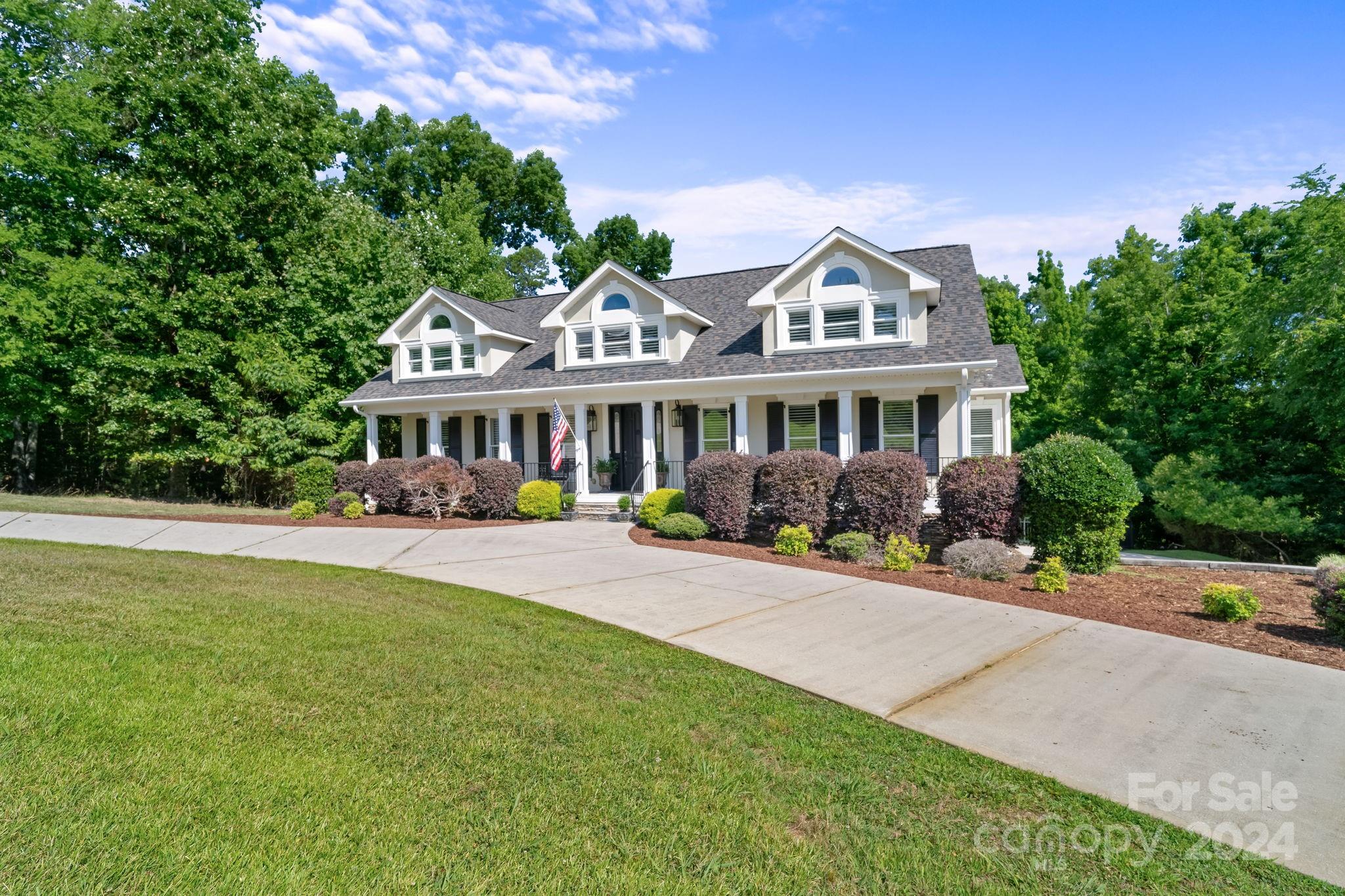 2049 Rocky Stream Road York, SC 29745 - Photo 43 of 47 a front view of a house with yard and green space