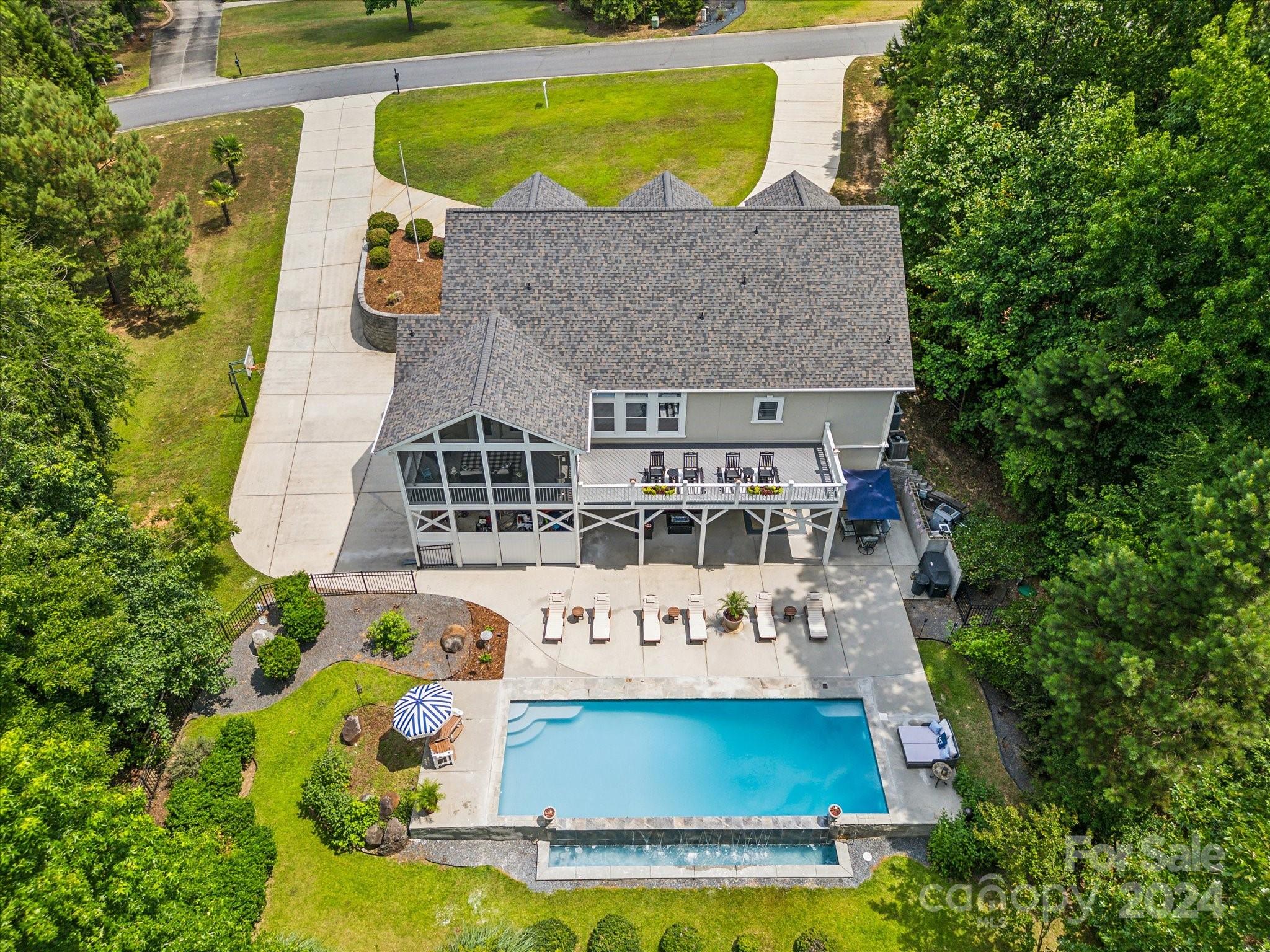 2049 Rocky Stream Road York, SC 29745 - Photo 45 of 47 an aerial view of a house with swimming pool and garden