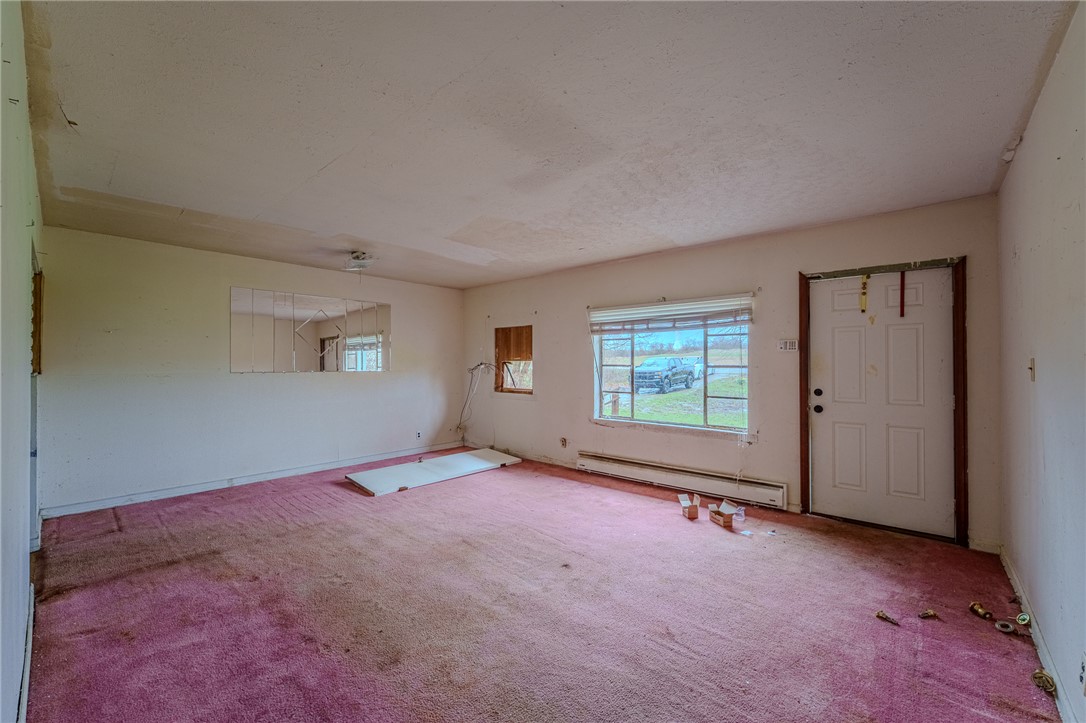 5839 Shaker Road Franklin, OH 45005 - Photo 5 of 18 This spacious living area offers abundant natural light and an inviting atmosphere.
