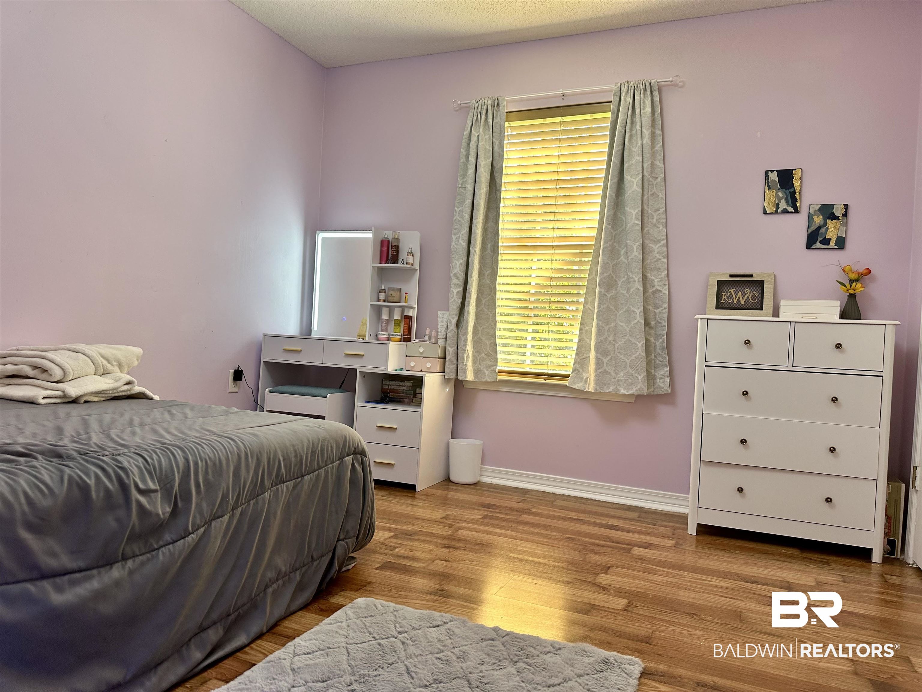 2456 Smith Road Castleberry, AL 36432 - Photo 17 of 26 Bedroom with light hardwood / wood-style flooring