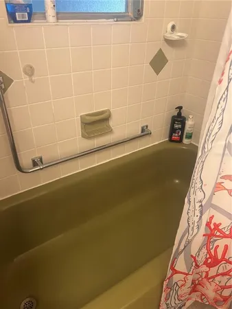 a bathroom with a bathtub