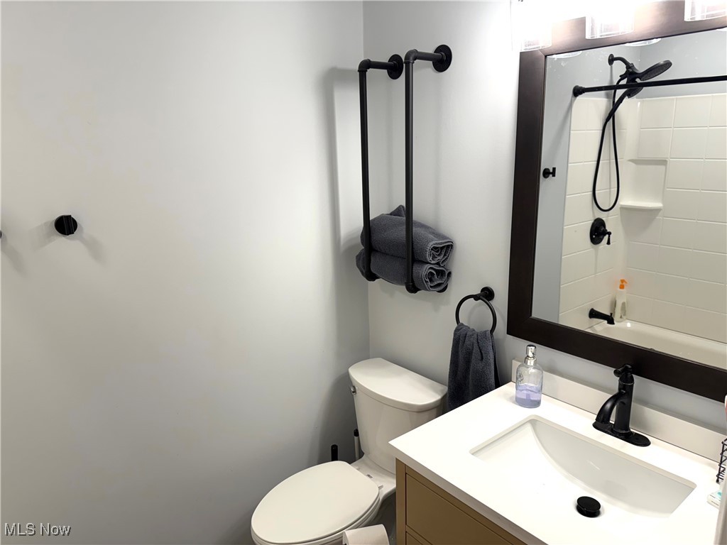 975 Som Center Road Cleveland, OH 44143 - Photo 18 of 18 Full bathroom with vanity, shower / bathtub combination, and toilet