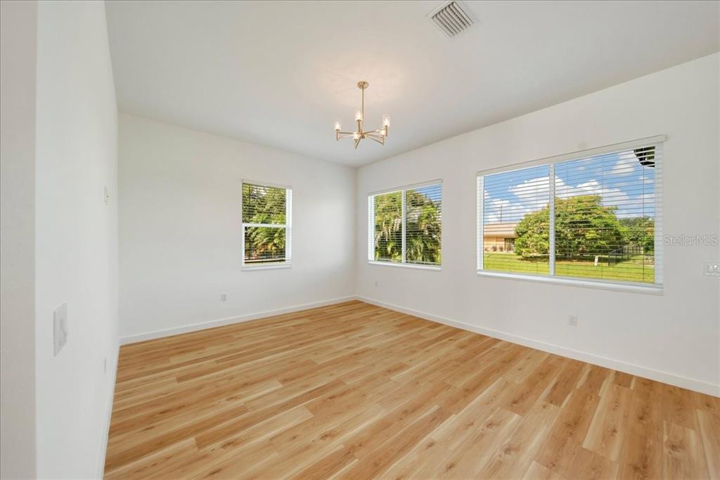 1215 Rio De Janeiro Avenue Punta Gorda, FL 33983 - Photo 9 of 65 a view of an empty room with a window