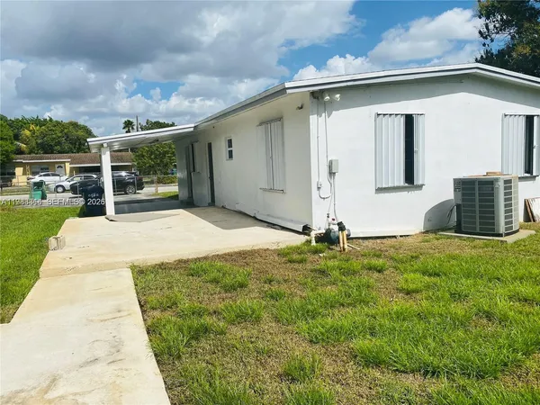 a front view of house with yard