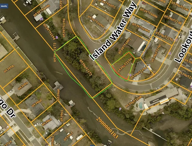 a view of a yard with a house