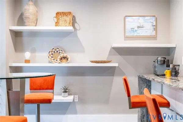 a workspace with furniture and window