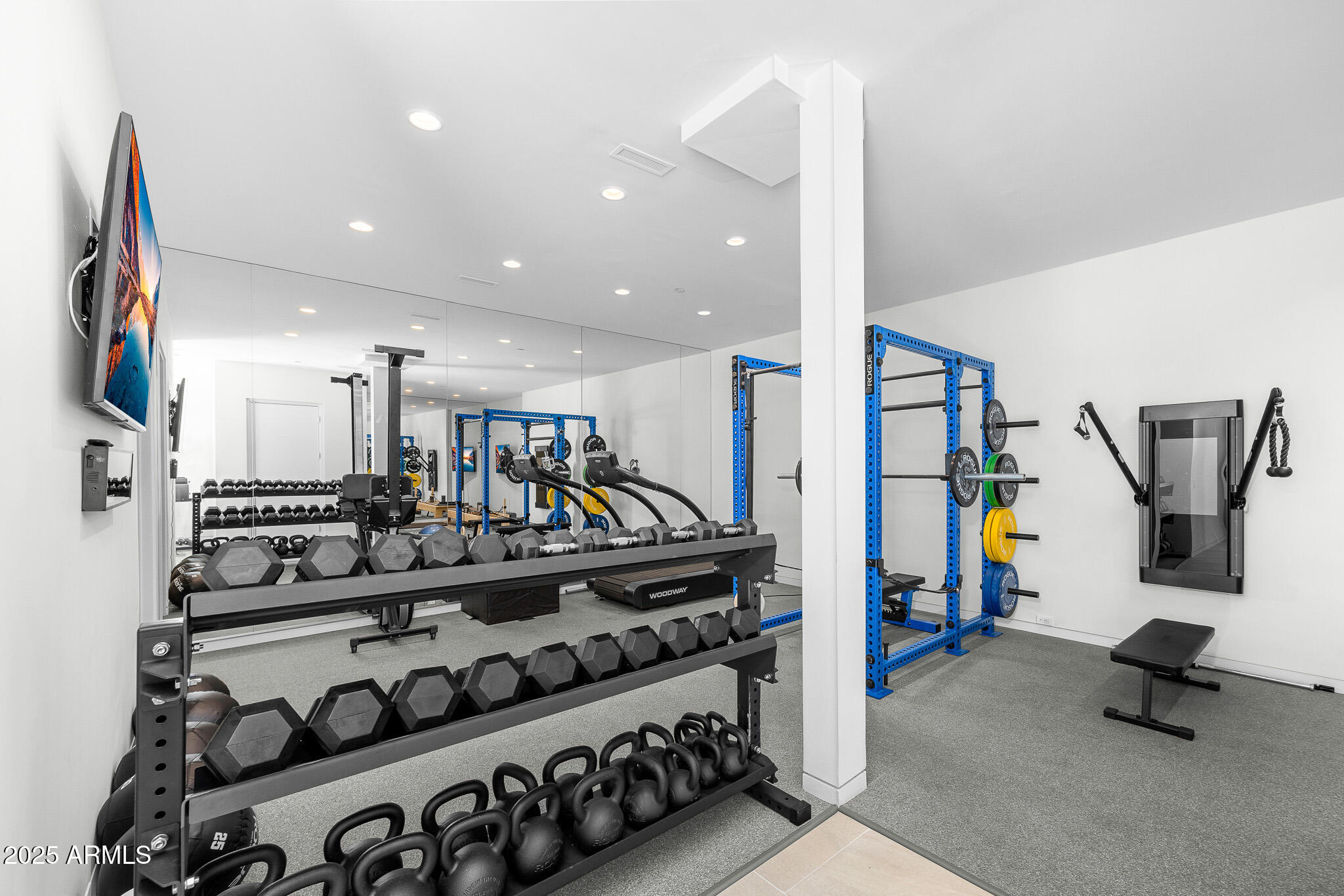 6149 East Indian Bend Road Paradise Valley, AZ 85253 - Photo 30 of 77 a view of a room with gym equipment