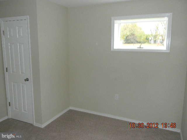 1403 Love Point Road Stevensville, MD 21666 - Photo 22 of 30 Lower Level In-Law Bedroom