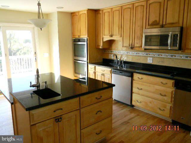1403 Love Point Road Stevensville, MD 21666 - Photo 5 of 30 Kitchen with 2 level Island