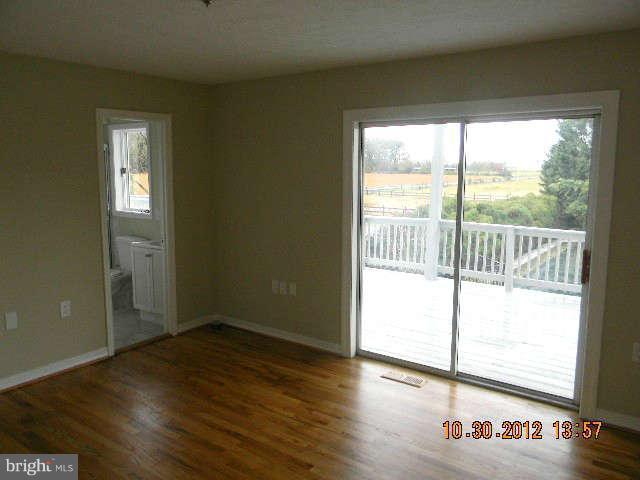 1403 Love Point Road Stevensville, MD 21666 - Photo 10 of 30 Main Level Master Bedroom