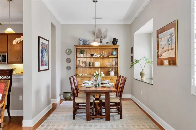 a spacious bedroom with a bed and wooden floor