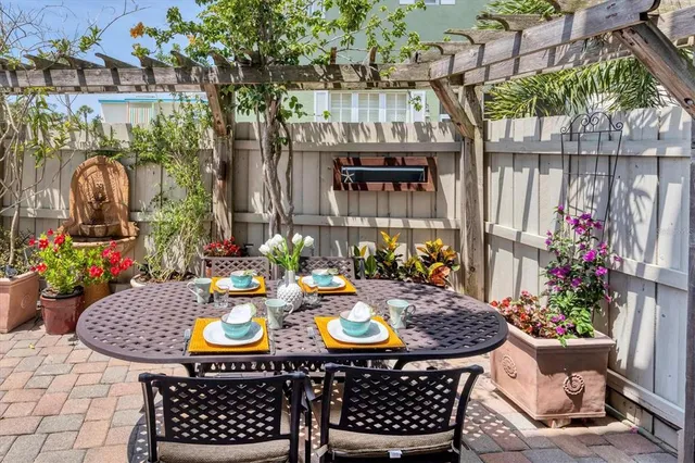 a view of a building with sitting area