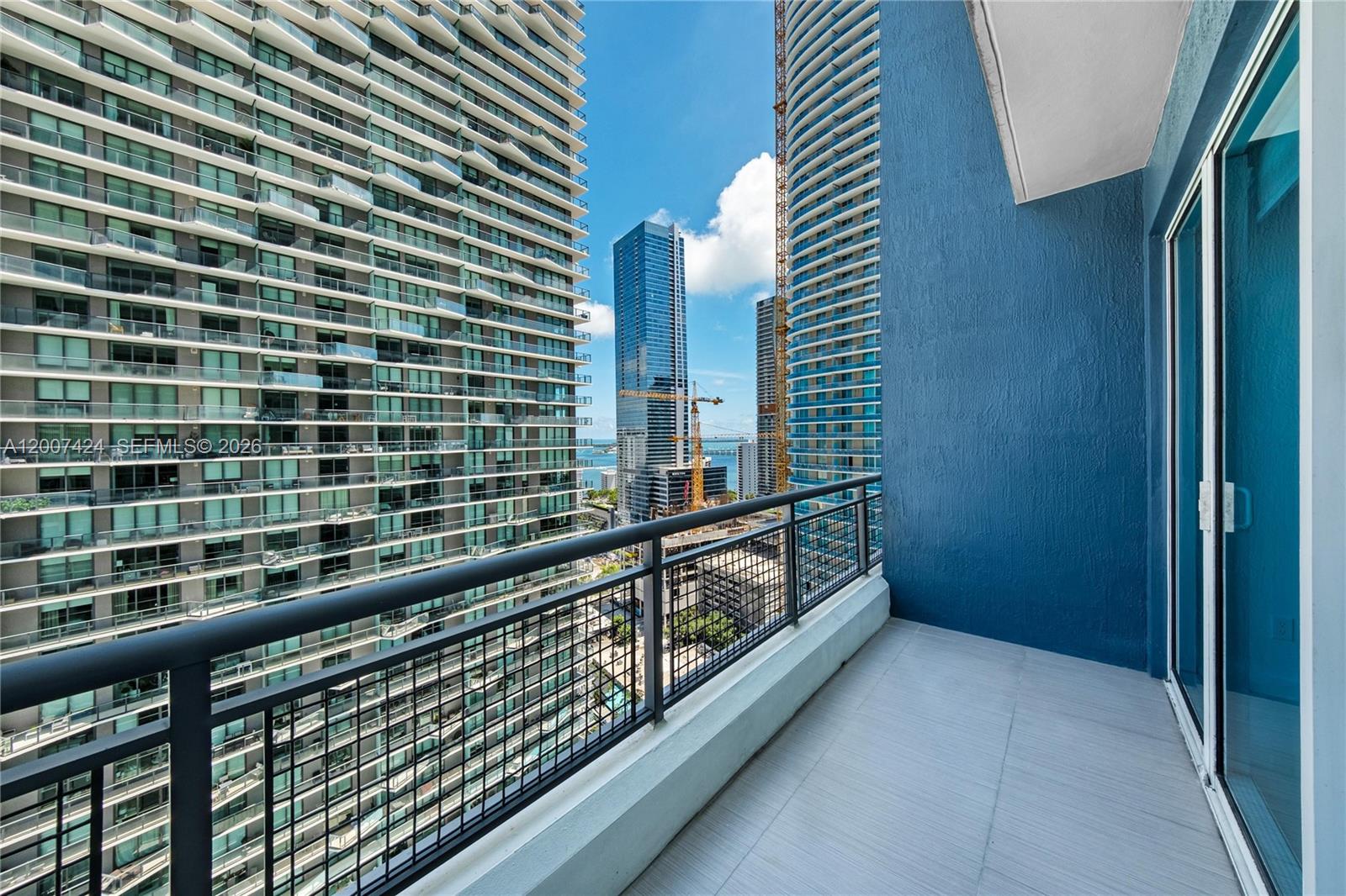 60 Southwest 13th Street, Unit 2420 Miami, FL 33130 - Photo 14 of 30 a view of balcony with a potted plant