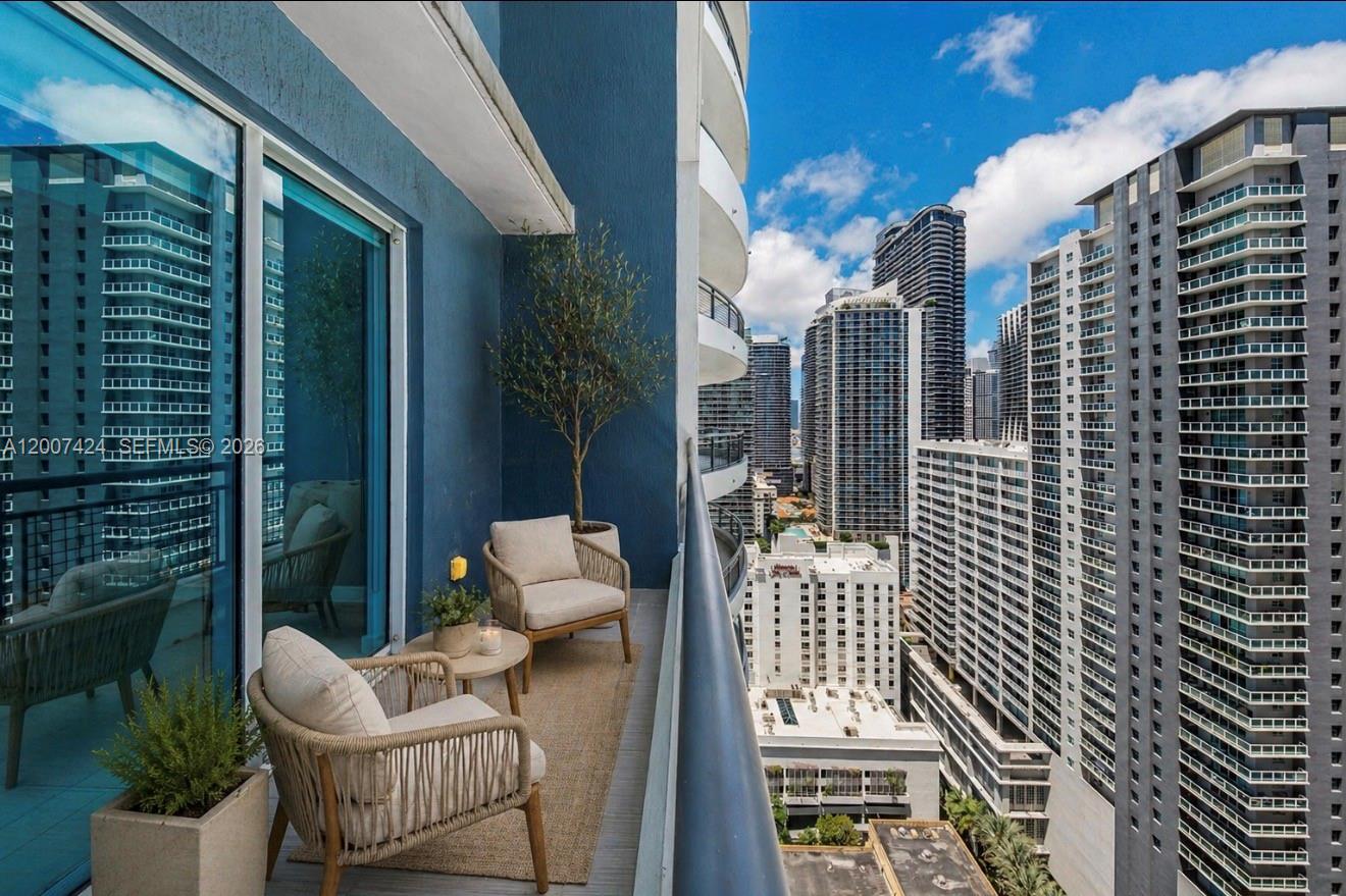 60 Southwest 13th Street, Unit 2420 Miami, FL 33130 - Photo 29 of 30 a view of balcony with couch