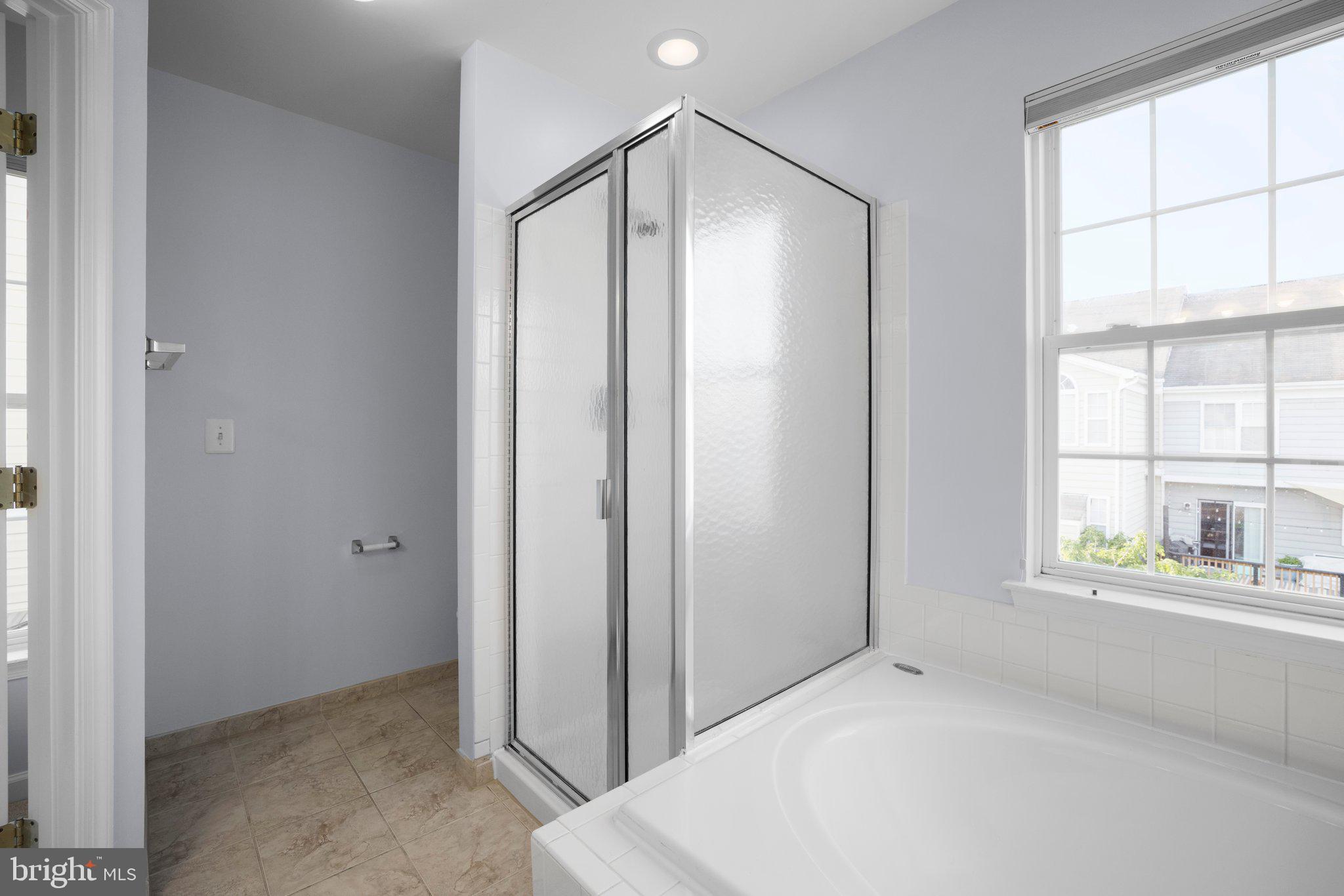 43002 Center Street Chantilly, VA 20152 - Photo 15 of 35 a view of an empty room with a window